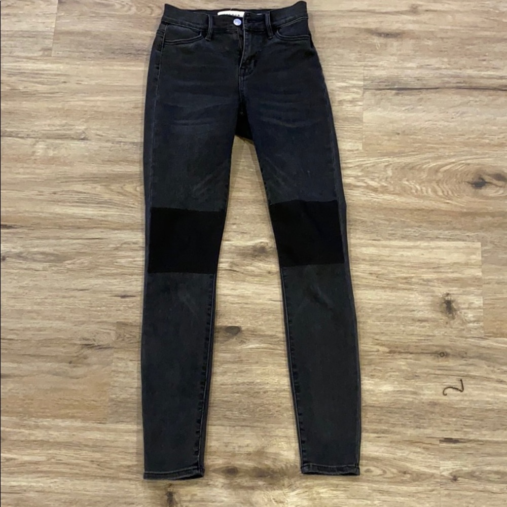 Faded black jeans with black patches at knees!